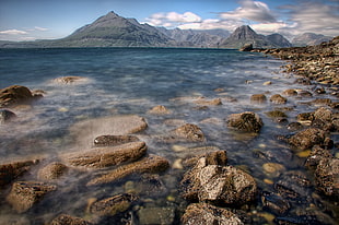 stone fragments on body of water during daytime, elgol HD wallpaper