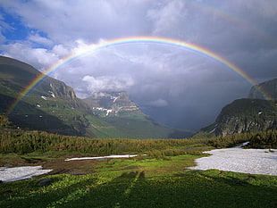 photo of rainbow in landscape