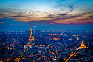 aerial photo of lighted Eiffel Tower and cityscape