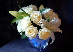 photo of bouquet of white rose