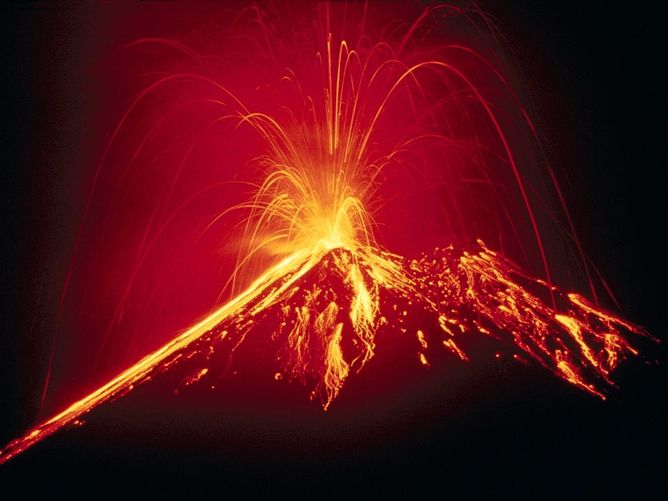 erupting volcano during night time HD wallpaper