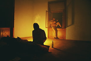 silhouette of a man sitting on the sofa, cannon, guitar, music, men