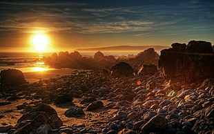 brown rock monolith, rock, coast, sunset, beach HD wallpaper