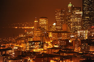 city building lights during night time, seattle, washington, usa