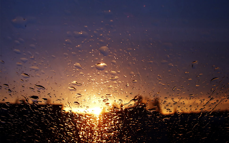 water drops on window during sunset HD wallpaper