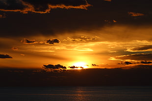 silhouette of clouds, sunlight, sea, sunset, water HD wallpaper