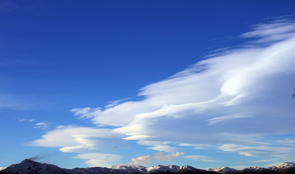 mountain under white clouds photography HD wallpaper