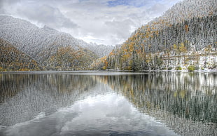 gray mountain on body of waters during daytime HD wallpaper