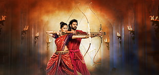 man and woman holding arrows with bows HD wallpaper
