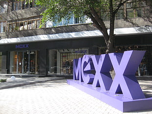 purple MEXX free standing letter signage