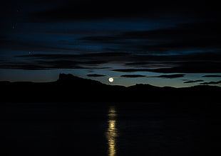 landscape photography of mountain under full moon