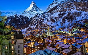 village under snow covered mountain, nature, landscape, evening, lights HD wallpaper