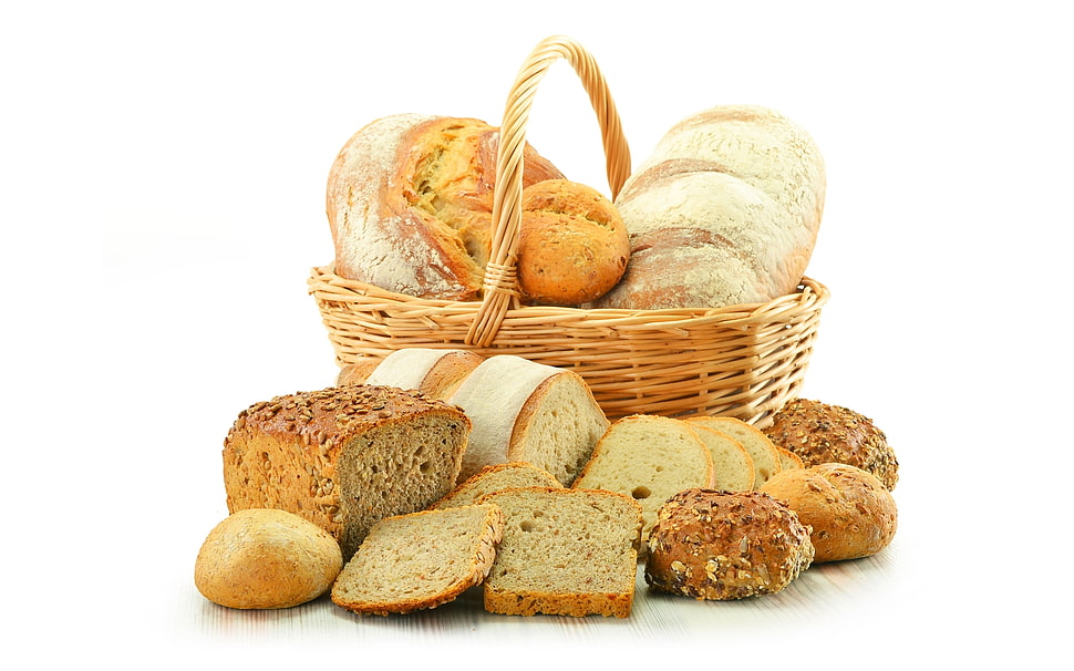 brown and white bread on brown wicker basket HD wallpaper