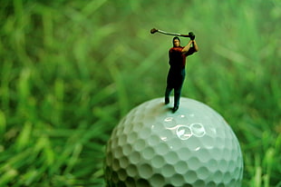 macro shot photography of golf player