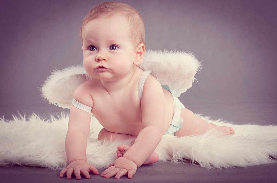infant dressed as angel photography HD wallpaper