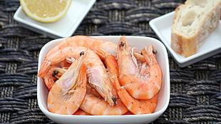 cooked shrimp on white ceramic saucer