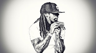 man in cap holding microphone