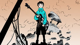 boy in teal hoodie holding guitar