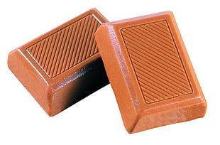 two brown rectangular chocolates