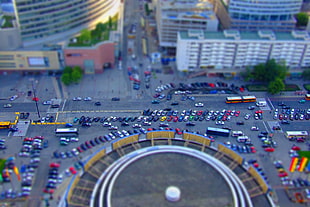 aerial view photography of assorted-color car lot at daytime
