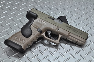 gray and black semi automatic pistol