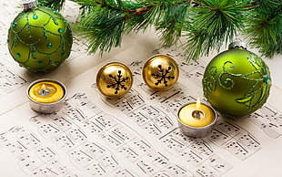 two green baubles