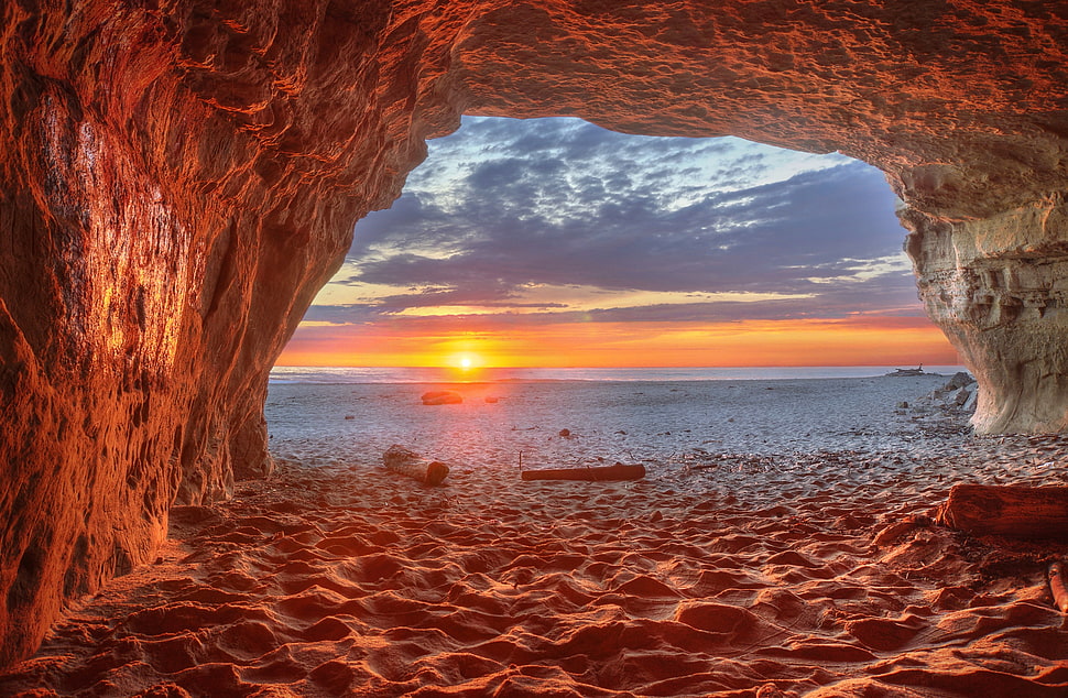 cave and view of sunset HD wallpaper