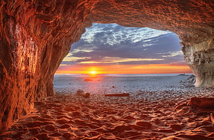 cave and view of sunset HD wallpaper