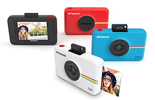several Polaroid camera