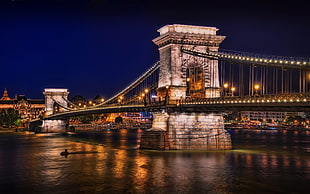 grey Brooklyn Bridge, New York during nightime HD wallpaper
