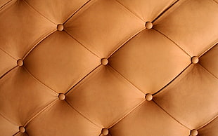 brown leather tufted surface HD wallpaper