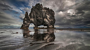 brown and white concrete house, clouds, rock, landscape