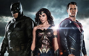 Superman, Wonder Woman, and Batman standing side-by-side HD wallpaper