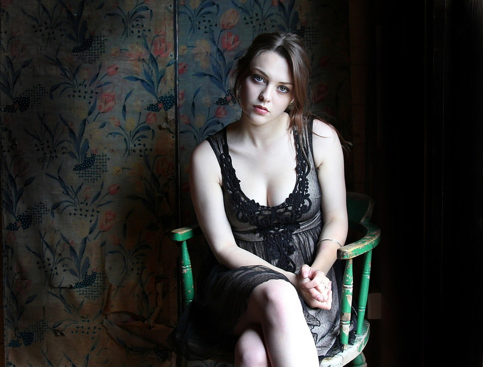 woman wearing scoop-neck dress sitting on smoker bow chair HD wallpaper