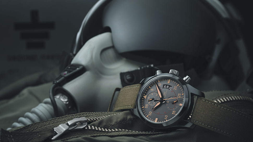 round black chronograph watch with green leather strap, watch, helmet, IWC HD wallpaper