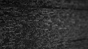 selective focus photography of java language