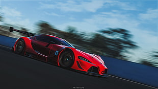 red luxury car on road photography