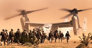 soldiers next to grey helicopter movie scene
