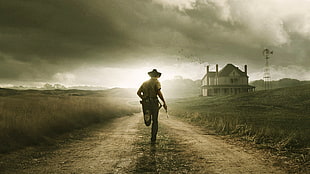 man wearing cowboy hat running on road near white wooden house HD wallpaper