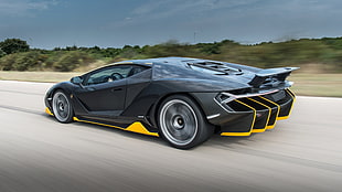 black and yellow Lamborghini Aventador