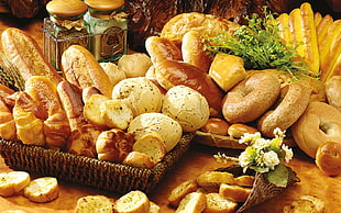 baked breads with brown wicker basket HD wallpaper