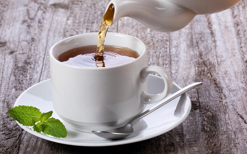 still life photography of white ceramic teapot pouring tea on ceramic teacup HD wallpaper