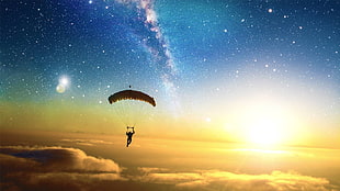 man with parachute above clouds HD wallpaper