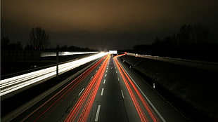 red and white pool table, road, long exposure, traffic, night