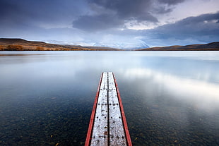 red and gray dock under blue sky, lake alexandrina
