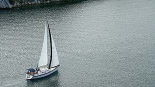 white sail boat on body of water HD wallpaper