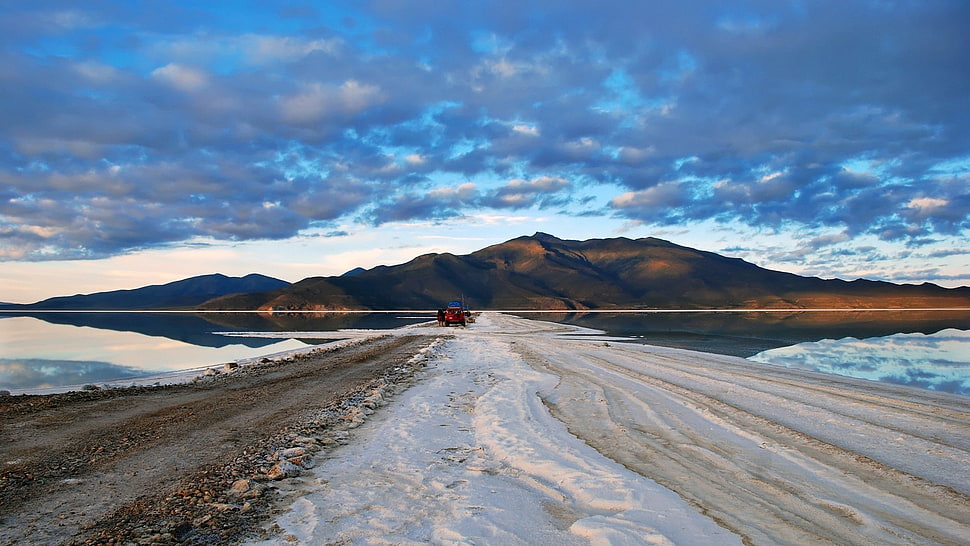 straight sand road beside body of water, landscape HD wallpaper