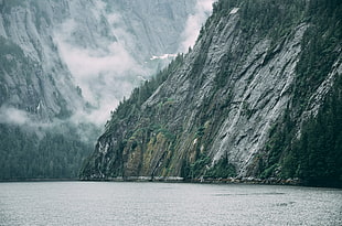 landscape photography of gray mountain near body of water during daytime HD wallpaper