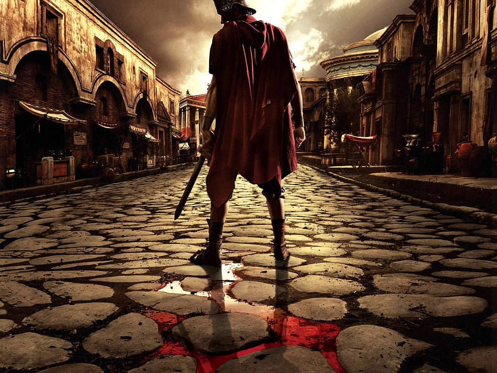 roman soldier holding sword wearing red cape standing on streets HD wallpaper