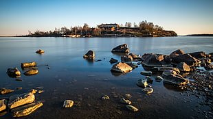brown house near body of water photographu, finland HD wallpaper